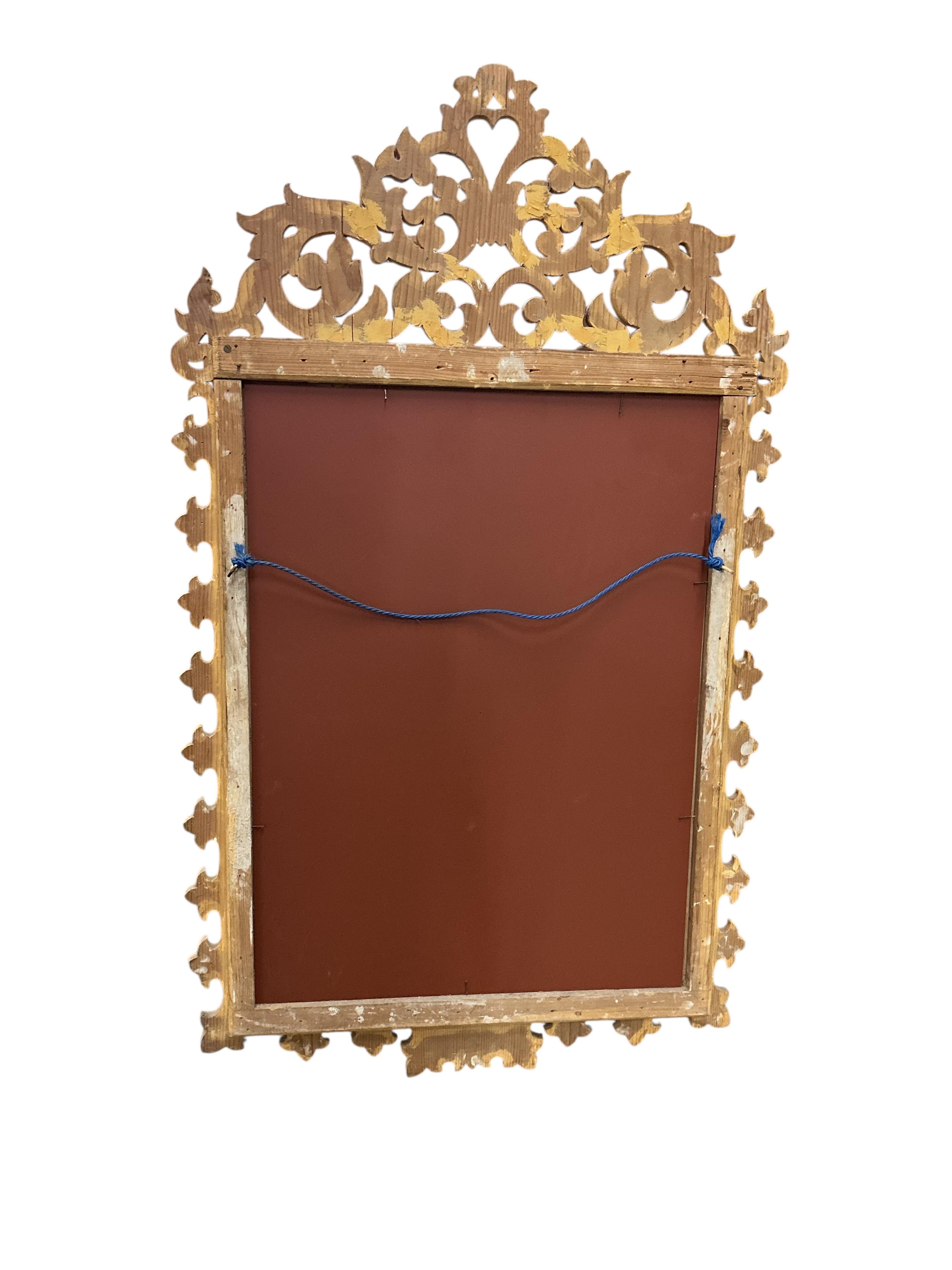 A pair of Italian painted carved giltwood wall mirrors, width 72cm, height 125cm